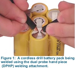 Figure 1:  A cordless drill battery pack being welded using the dual probe hand piece (DPHP) welding attachment.