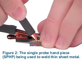 Figure 2: The single probe hand piece (SPHP) being used to weld thin sheet metal.